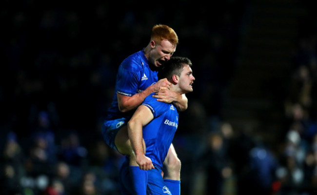 Conor O'Brien celebrates scoring a try with Ciaran Frawley