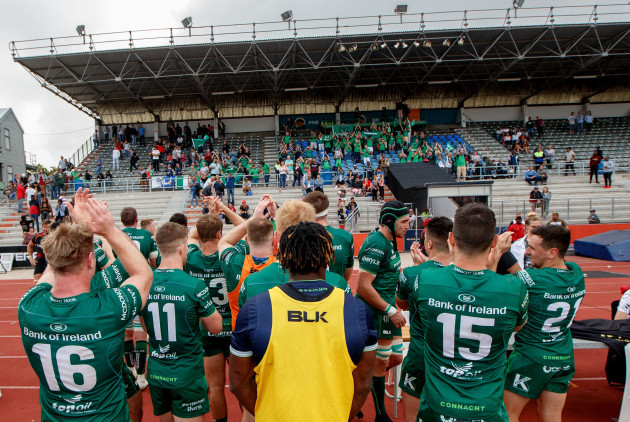 Connacht players applaud the fans