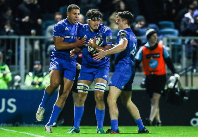 Max Deegan celebrates scoring a try with Adam Byrne and Jimmy O'Brien