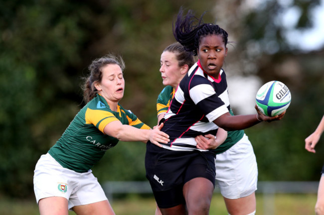 Emer O'Mahony with Nicole Caughey tackle Linda Djougang