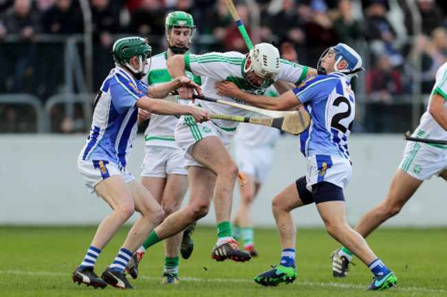 Michael Fennelly with Aidan Mellett and Collie Basquel