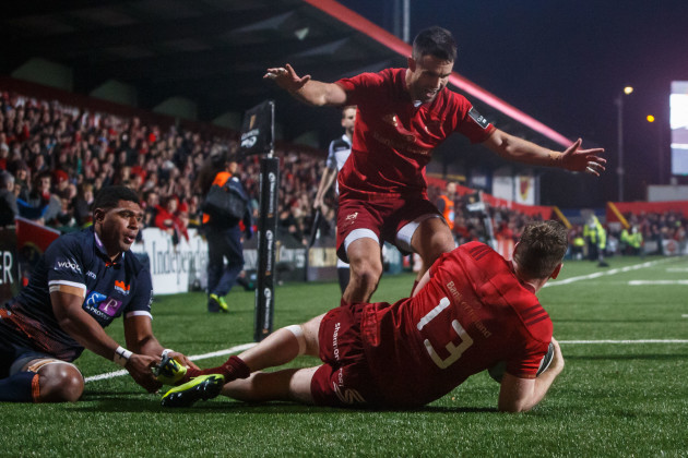 Chris Farrell celebrates scoring a try with Conor Murray
