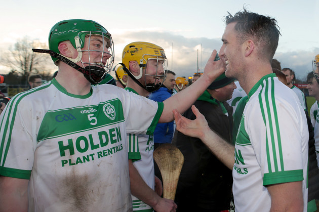 Evan Shefflin and Colin Fennelly celebrate Sunday's win.