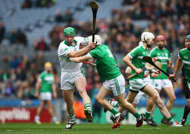 Henry Shefflin is tackled by Alan Cuddihy