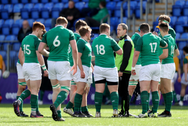 Tom Tierney talks to his side after conceding a try