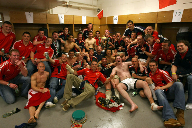 The Munster Squad celebrate in the changing room with the Heineken Cup Trophy