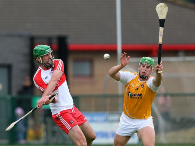 Matthew Donnelly tries to block down Ruairi Convery