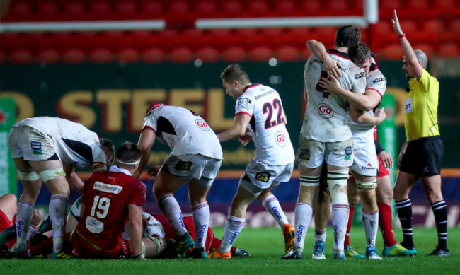 Jordi Murphy and Iain Henderson celebrate at the final whistle