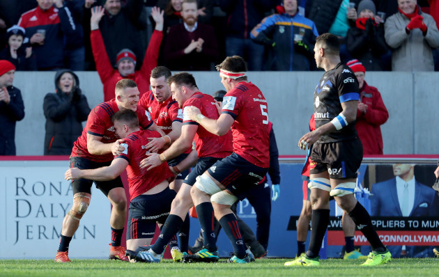 Rory Scannell celebrates scoring his sides first try with Andrew Conway, JJ Hanrahan, Niall Scannell and Billy Holland