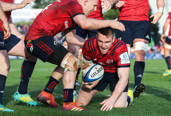 Rory Scannell celebrates scoring his sides first try