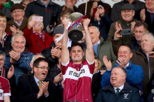 Shane Mulligan lifts the trophy