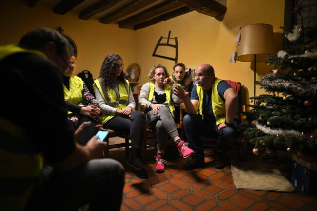 Yellow Vests Watching Emmanuel Macron Speech