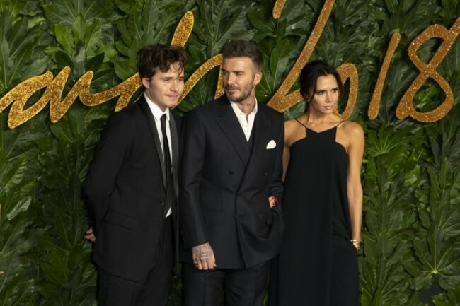 Brooklyn Beckham, David Beckham and Victoria Beckham attend The Fashion Awards 2018 at The Royal Albert Hall. London, UK. 10/12/2018