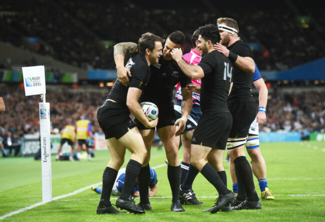 Ben Smith celebrates his try with teammates