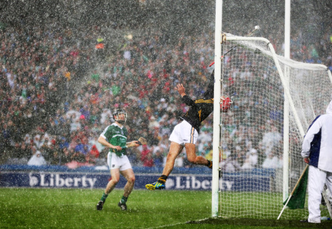 David Herity attempts to prevent the sliotar from going over the bar