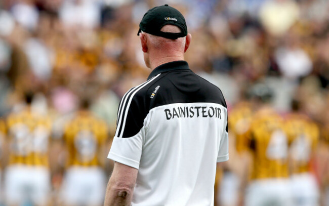 Brian Cody looks on as the Kilkenny team photo is taken