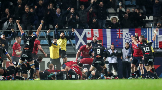 Castres celebrate scoring a try