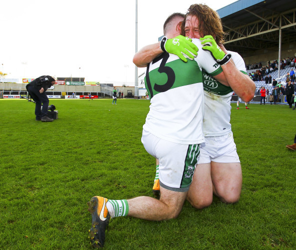 Ricky Maher celebrates with Cahir Healy at the end of the game