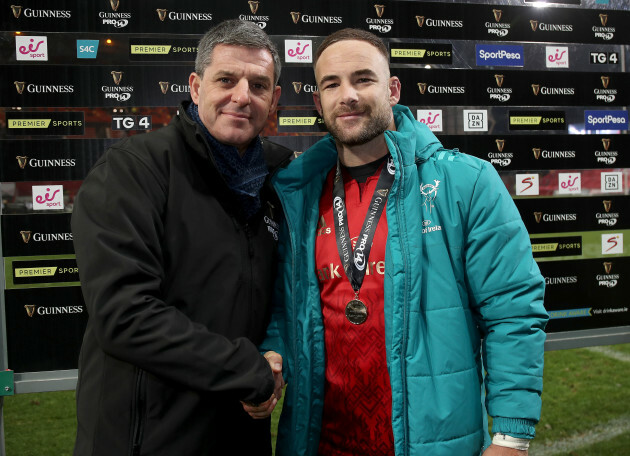 Alby Mathewson receives the man of the match medal from Ken O'Callaghan