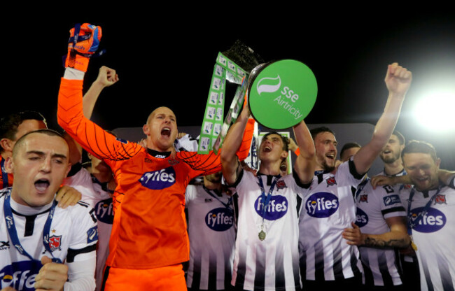 Gary Rogers and Jamie McGrath celebrate with the trophy