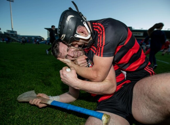 Wayne Hutchinson celebrates the final whistle with JJ Hutchinson