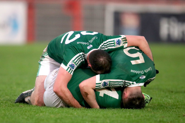 Peter McGee, Niall Friel and Christopher McFadden celebrate at the final whistle