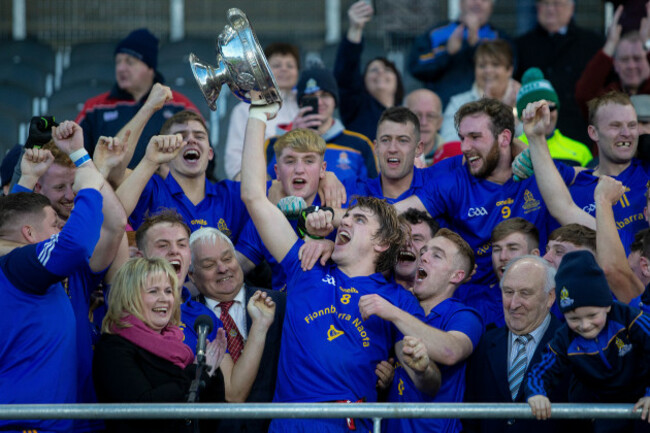 Ian Maguire celebrates with the trophy