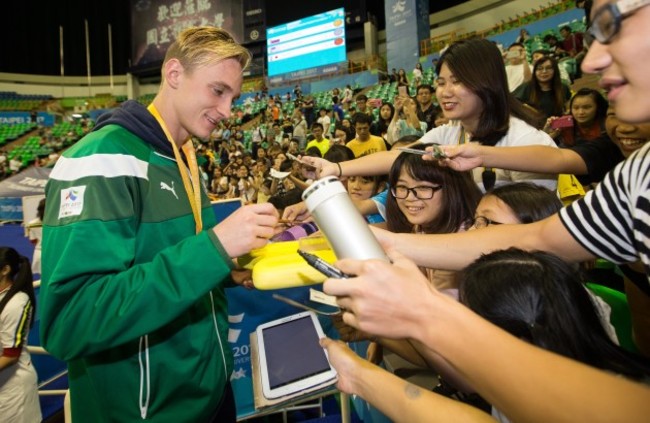 Shane Ryan signs autographs