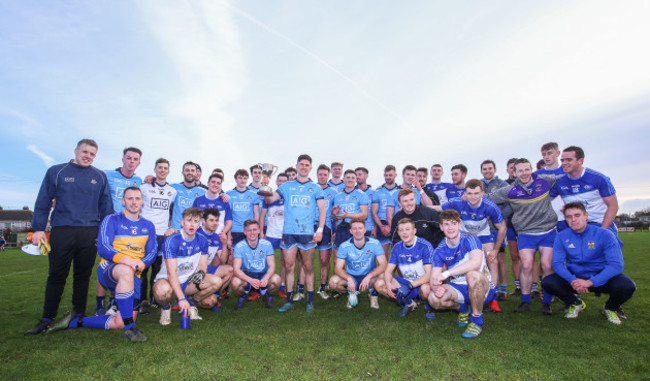 Dublin celebrate after the game with the trophy