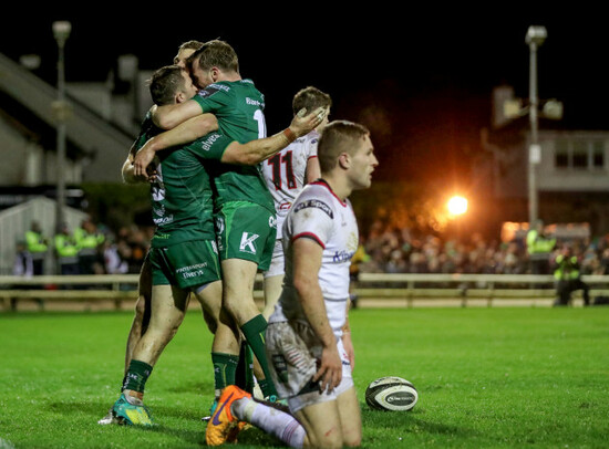 Caolin Blade celebrates scoring a try with Kyle Godwin and Jack Carty