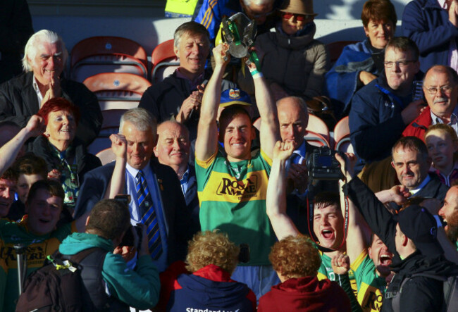 John O'Keeffe raises the cup