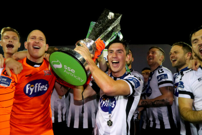 Jamie McGrath celebrates with the trophy