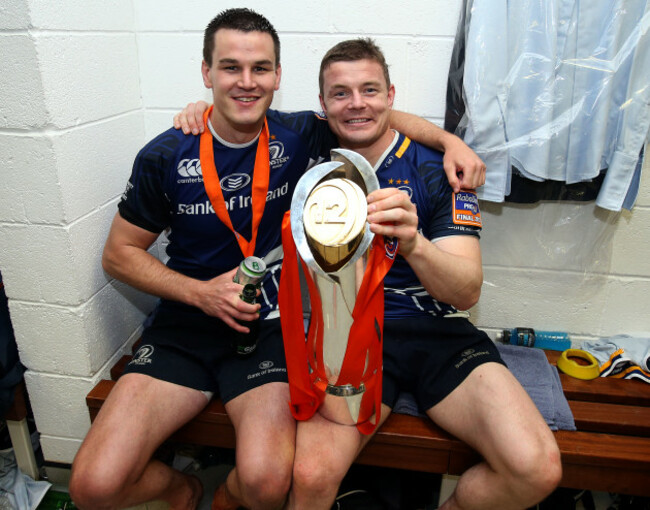 Jonathan Sexton and Brian O'Driscoll celebrate