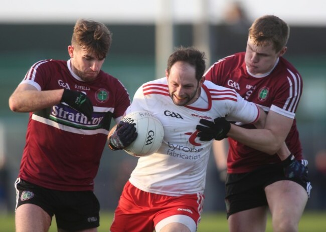 Ronan McNabb with Stephen McConville and Oisin O'Neill