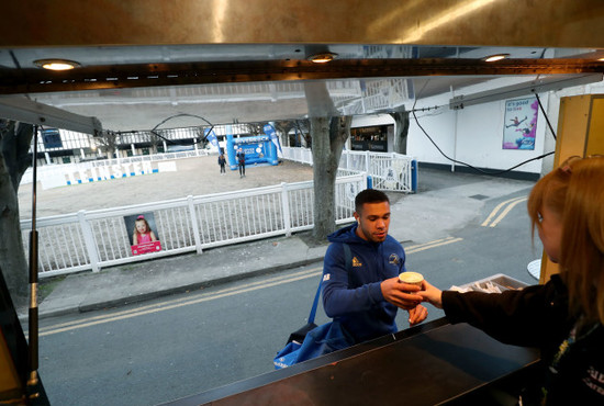 Adam Byrne gets a coffee before the game