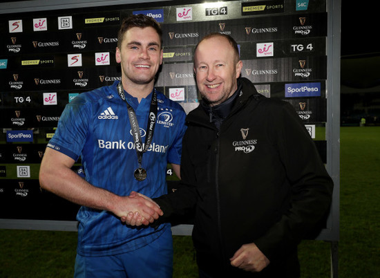 Conor O'Brien receives the man of the match medal from Rory Sheridan