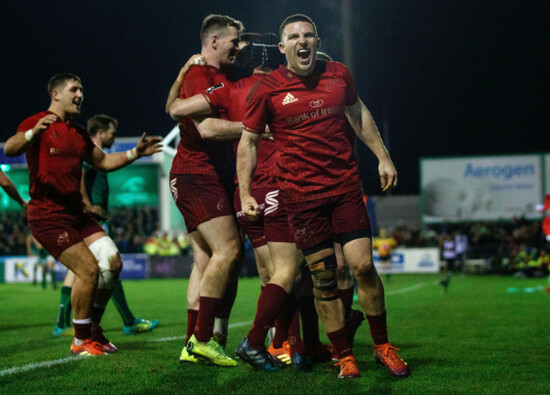 Andrew Conway celebrates after Joey Carbery scored his sides fourth try