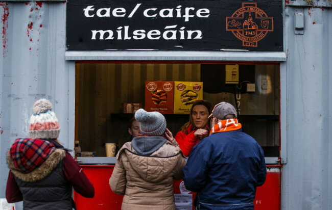 Supporters get refreshments before the game