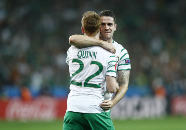 Robbie Brady celebrates with Stephen Quinn
