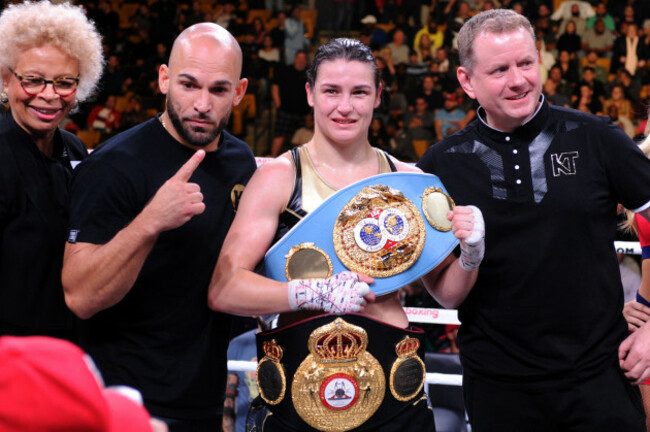 Katie Taylor celebrates her victory with her team