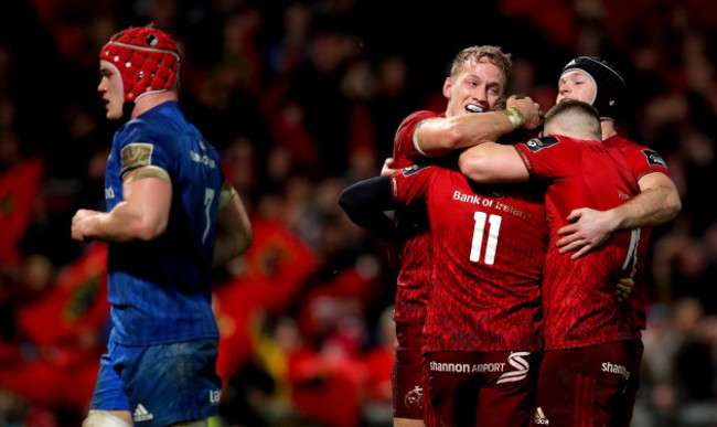 Keith Earls celebrates scoring with Mike Haley, Andrew Conway and Tyler Bleyendaal