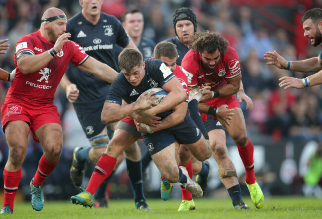 Leinsters Garry Ringrose  is tackled by Toulouse's Antoine Dupont