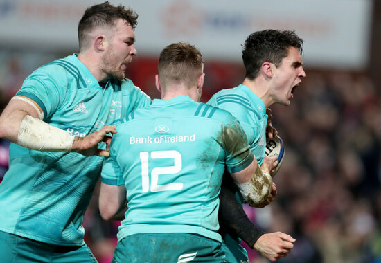 Joey Carbery celebrates scoring the opening try