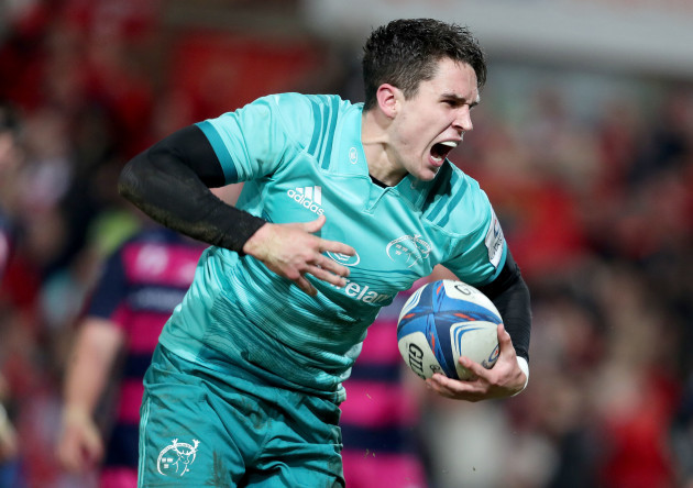 Joey Carbery celebrates scoring the opening try