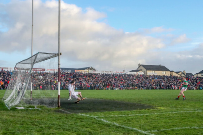 James Kelly scores a penalty