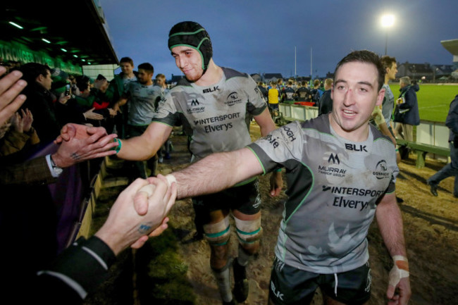 Ultan Dillane and Denis Buckley celebrate after the game with fans