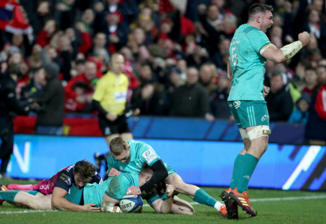 Keith Earls and Peter O'Mahony celebrate as Rory Scannell scores their second try