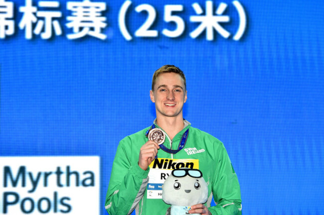 Shane Ryan celebrates with his bronze medal