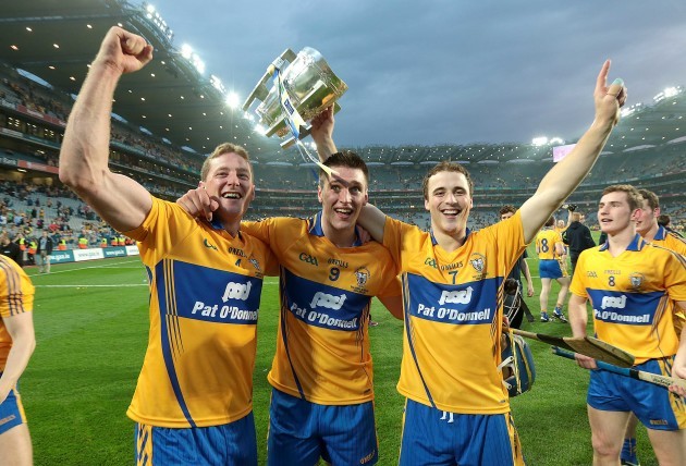 Cian Dillon, Conor Ryan and Patrick O'Connor celebrate with the Liam McCarthy