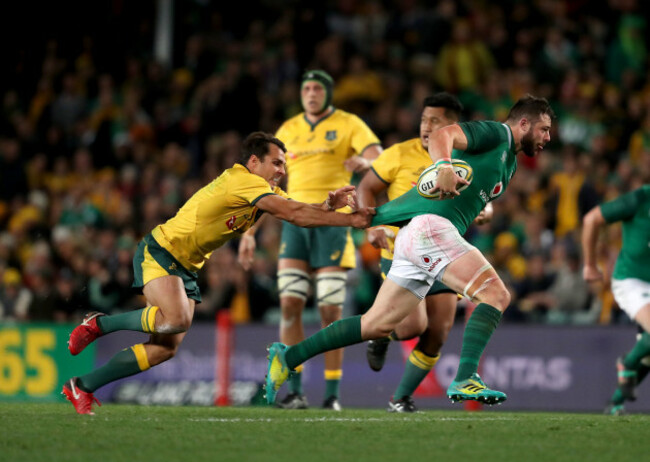 Robbie Henshaw is tacked by Nick Phipps